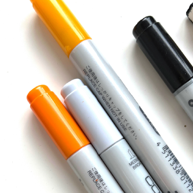 thewedesign Bildausschnitt von Copic Ciao Markern in Orange-Farbtönen.